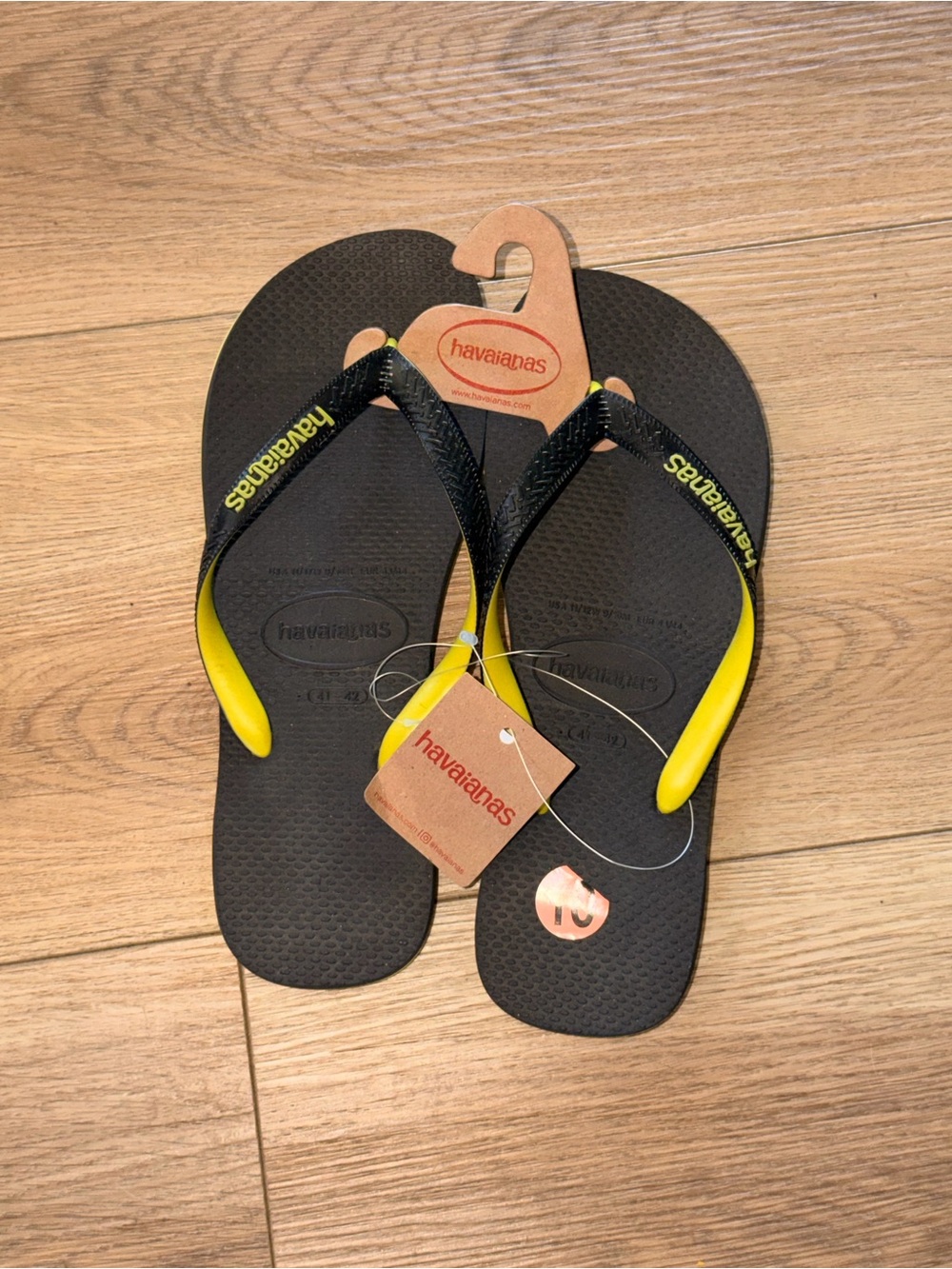 Havaianas Black Flip Flops with Yellow Straps
